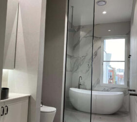 Black framed shower panel - Frameless Impressions