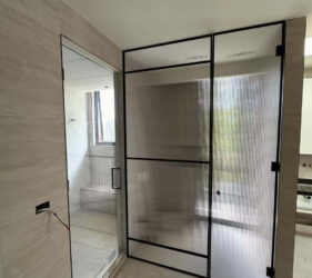 Manhattan style reeded glass doors + crystal clear sauna entry door - Frameless Impressions